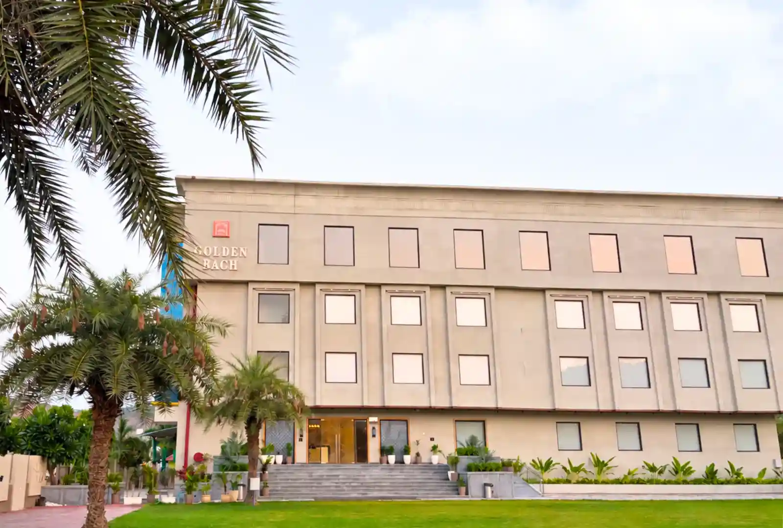 Grand Resort Entrance & Palm Trees - Golden Bagh Alwar